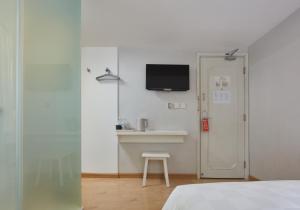 Voodi või voodid majutusasutuse Ole Tai Sam Un Hotel toas