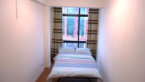 Postel nebo postele na pokoji v ubytování Hotel Ryan