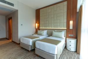 Posezení v ubytování Grand Bellagio Batumi Convention & Casino Hotel