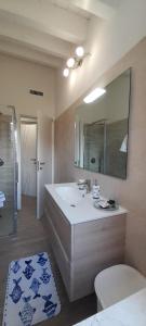 Koupelna v ubytování Casa vacanze Gli Ulivi + 11 fotografií