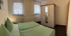 Postel nebo postele na pokoji v ubytování Ferienwohnung Lucky Soest