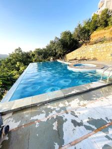 Bazén v ubytování The Sky Imperial Pavoreal Jungle Resort nebo v jeho okolí