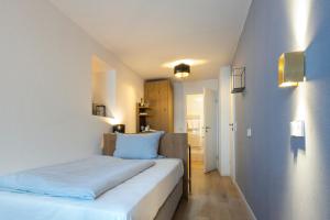 Voodi või voodid majutusasutuse Genusshotel Krone & Roadtrips bei Basel toas