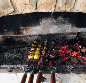 a grill with a bunch of food on it at Honi in Ijevan