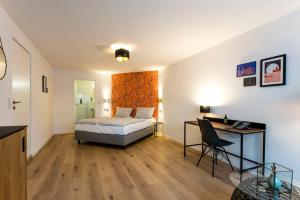 Voodi või voodid majutusasutuse Genusshotel Krone & Roadtrips bei Basel toas