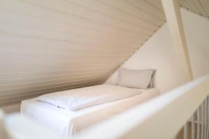 Voodi või voodid majutusasutuse Genusshotel Krone & Roadtrips bei Basel toas