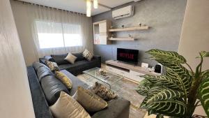 Posezení v ubytování Haut Standing Appartement - Centre Ville Oujda