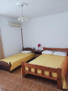 Postel nebo postele na pokoji v ubytování P&G APARTMENTS