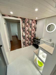 an overhead view of a bathroom with a sink at Big Duplex, 15min to Turku or Naantali in Turku