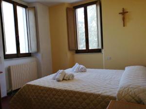 Casa per Ferie Ulivo d'Assisi客房内的一张或多张床位