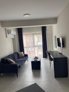 TV a/nebo společenská místnost v ubytování JK BUSINESS HOTEL