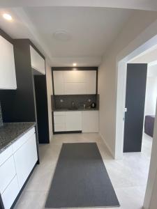 Kuchyň nebo kuchyňský kout v ubytování JK BUSINESS HOTEL