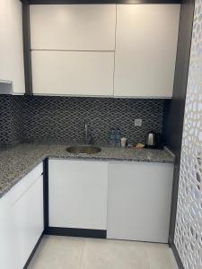 Kuchyň nebo kuchyňský kout v ubytování JK BUSINESS HOTEL