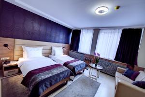 Ліжко або ліжка в номері Hotel Srbija Garden-FREE PARKING
