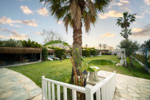 A garden outside Tiana Beach Resort