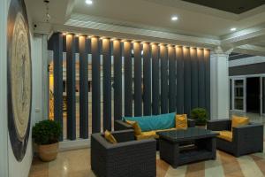 A seating area at Tiana Beach Resort