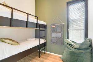 Katil dua tingkat atau katil-katil dua tingkat dalam bilik di Soof Heuvelrug