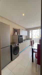 Kuchyň nebo kuchyňský kout v ubytování Haut Standing Appartement - Centre Ville Oujda