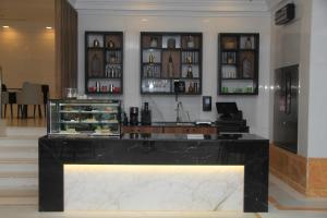 a bar in a room with a counter top at Mysk Touch Al Balad in Al Madinah
