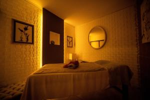 A bed or beds in a room at Tiana Beach Resort