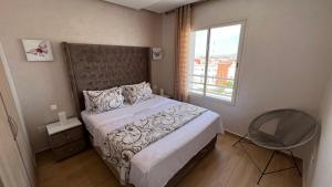Postel nebo postele na pokoji v ubytování Haut Standing Appartement - Centre Ville Oujda