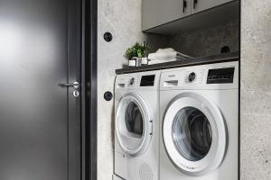 a white washer and dryer in a kitchen at Charming cottage in Vemdalen near skiing in Vemdalen