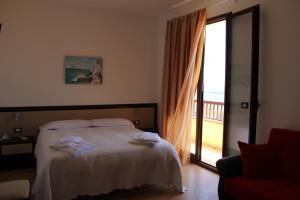 Voodi või voodid majutusasutuse Albergo Perseo toas