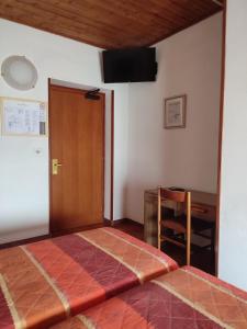 Fotografie z fotogalerie ubytování Albergo Villa Mimosa v destinaci Nago-Torbole