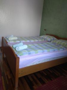 Postel nebo postele na pokoji v ubytování Zelena oaza Apartment