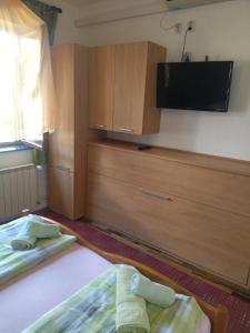 Postel nebo postele na pokoji v ubytování Zelena oaza Apartment