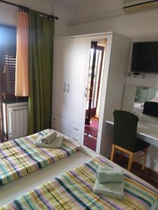 Postel nebo postele na pokoji v ubytování Zelena oaza Apartment
