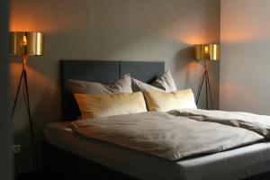 Postel nebo postele na pokoji v ubytování American Ease Apartments - Hahnbach, Vilseck, Weiden + 37 fotografií