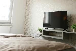TV a/nebo společenská místnost v ubytování American Ease Apartments - Hahnbach, Vilseck, Weiden