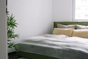 Postel nebo postele na pokoji v ubytování American Ease Apartments - Hahnbach, Vilseck, Weiden
