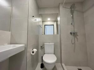 Kúpeľňa v ubytovaní Figaro Suites