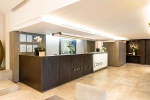 Лобби или стойка регистрации в Hotel Como