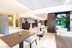 Кухня или мини-кухня в Hotel Como
