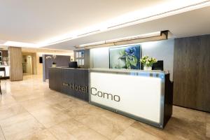 Лобби или стойка регистрации в Hotel Como