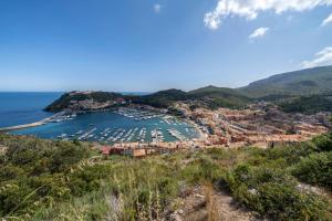 a view of a harbor on the island at Porto Ercole Guest House in Porto Ercole
