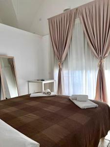 Foto dalla galleria di RESIDENZA ISABELLA rooms and apartments a Leverano