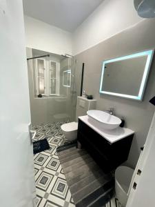a bathroom with a sink and a toilet at Luxury apartment Lukas in Orebić +22 photos