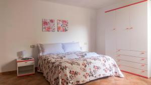 Ένα ή περισσότερα κρεβάτια σε δωμάτιο στο Riflessi sul mare +62 φωτογραφίες