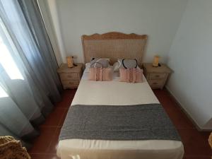 Postel nebo postele na pokoji v ubytování Urbanización Alcaudón premium by SIT ISLA CANELA