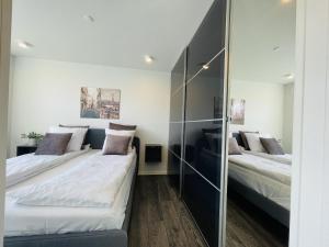 Postel nebo postele na pokoji v ubytování aday - Elegant Apartment with Terrace