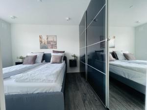 Postel nebo postele na pokoji v ubytování aday - Elegant Apartment with Terrace