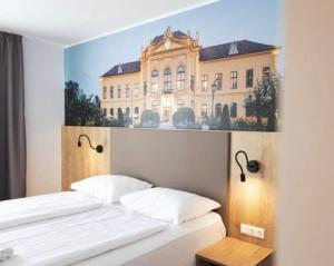 Postel nebo postele na pokoji v ubytování Hotel Am Sachsengang