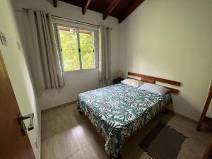 Säng eller sängar i ett rum på Casa Clean e Comfort, a mais completa de Paúba