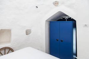 Łóżko lub łóżka w pokoju w obiekcie Villa Tina ai Piedi del Faro di Leuca