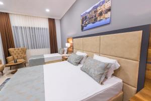 Кровать или кровати в номере Mc Palace Hotel Spa & Convention