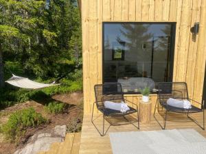 Aed väljaspool majutusasutust Forest cabin with stunning mountain view & Sauna